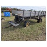 Flat rack dump wagon