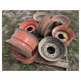 8 assorted skidloader rims