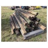 26 wooden fence posts