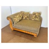 Tan Upholstered Chaise Lounge with Decorative Wood Trim