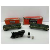 Lionel Train Cars with Original Boxes, Smoke Pellets, Wind-up Locomotive, and Small Figure
