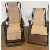 Two Folding Zero Gravity Lounge Chairs