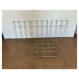 Four Chrome Plated Vinyl Roll Wall Racks