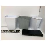 Panasonic Blu-ray Player, License Plate, and Three Trash Cans