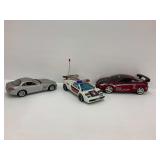 Two Radio Control Cars and Diecast Model
