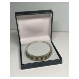 Silver Tone Stretch Bracelet with Olive Green and Clear Stones