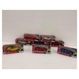 Eight NewRay 1/32 Scale Diecast Model Cars in Original Packaging