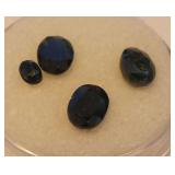 Four Black Agate Faceted Gemstones....3.75 carats