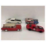Four Diecast Cars