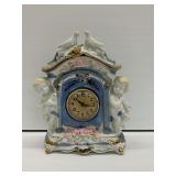 Porcelain Mantle Clock with Cherubs and Doves