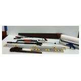 Variety of Tools Including a Hand Saw, Levels, and Grabbers