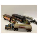Four Toy Semi-Trucks