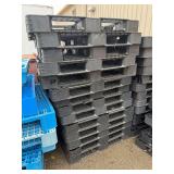 Assorted Black Plastic Pallets ... The Middle Stack Only