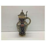 German Beer Stein with Pewter Lid and Embossed Decoration