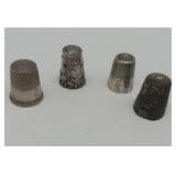 Four Silver Thimbles