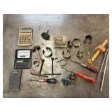 Mixed Lot of Hand Tools, Hole Saws, and Calculators