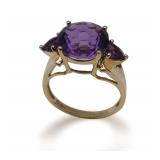 10K Gold Ring with Purple Stones...size 9