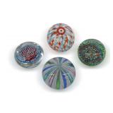 Four Art Glass Paperweights with Floral and Swirl Designs
