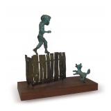 Bronze Sculpture of Boy Walking on Fence