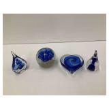 Four Glass Paperweights
