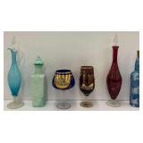 Six Glass Bottles and Goblets