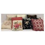 Ten Throw Pillows in Floral, Striped, and Geometric Designs