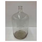 Large Glass Bottle Marked "Property of Klenzade Products Inc."