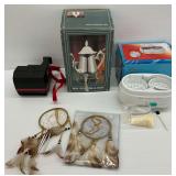 Polaroid Camera, New Wm. Rogers Coffee Pot, Dream Catchers, and Jewelry Cleaner