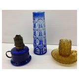 Three Glass Pieces - Cobalt Blue Oil Lamp, Blue Cut-to-Clear Vase, and Amber Candle Holder