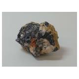 Mineral Specimen with Metallic Inclusions