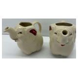 Pair of Shawnee Elephant Pitchers