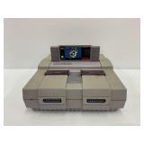 Super Nintendo SNES Console with Super Mario World Game Cartridge