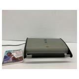 George Foreman Lean Mean Fat Reducing Grilling Machine, powers on