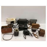 Cameras and Cases Including Heurtz, Keystone, Bell & Howell, and Canon