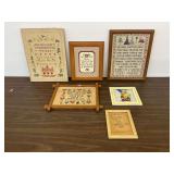 Framed Stitcheries and Cartoon Art