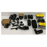 Collection of Nikon Camera Lenses, Speedlights, and Accessories
