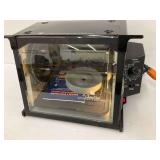 Ronco Jr. Showtime Rotisserie & BBQ Oven, powers on