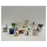 Figural Group with Mugs, Angel Figurines, and Camel Trinket Boxes