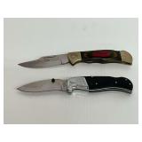 Two Folding Knives with Sheaths