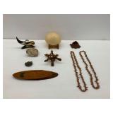 Decorative Items Including Egg, Fossil, and More