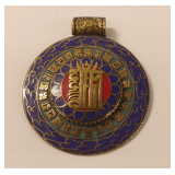 Ornamental Metal Medallion with Inscriptions