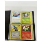 Pokemon Trading Cards in Binder...8 Pages