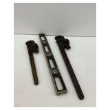 Two Pipe Wrenches and Level