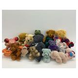 Group of Plush Stuffed Animals Including Teddy Bears and Frogs