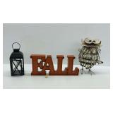 Three Decorative Items Including a Black Lantern, Illuminated Fall Sign and Whimsical Metal Owl