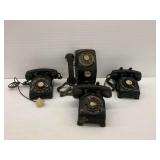 Four Black Rotary Dial Telephones