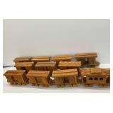 Eleven Handcrafted Wooden Train Cars