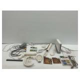 Nintendo Wii Console with Games and Accessories...powers on