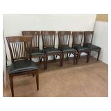 Six Wooden Chairs with Black Upholstered Seats