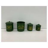 Four John Deere Canisters